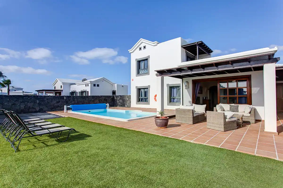Spacious outdoor lawn area at Hipoclub Villa Zafiro 34