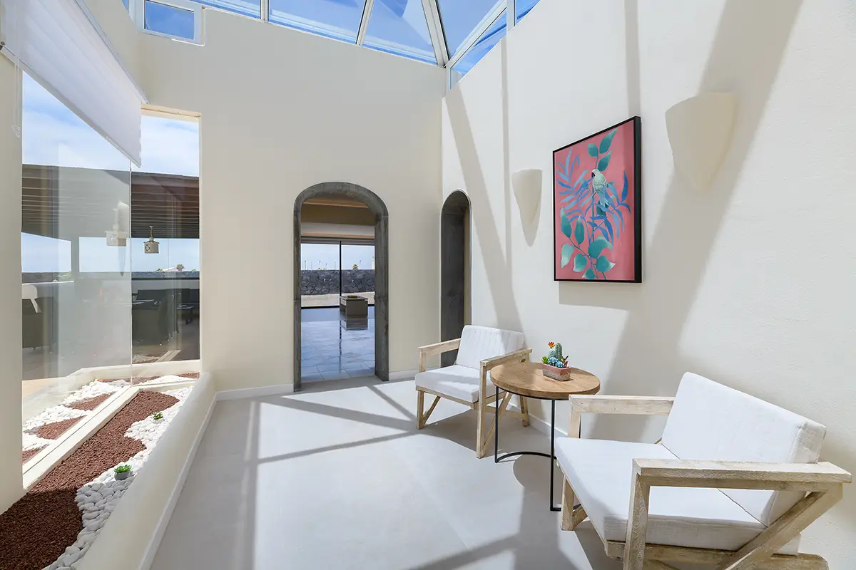 Armchairs in the viewing corridor at Villa Faro Park 189 Hipoclub
