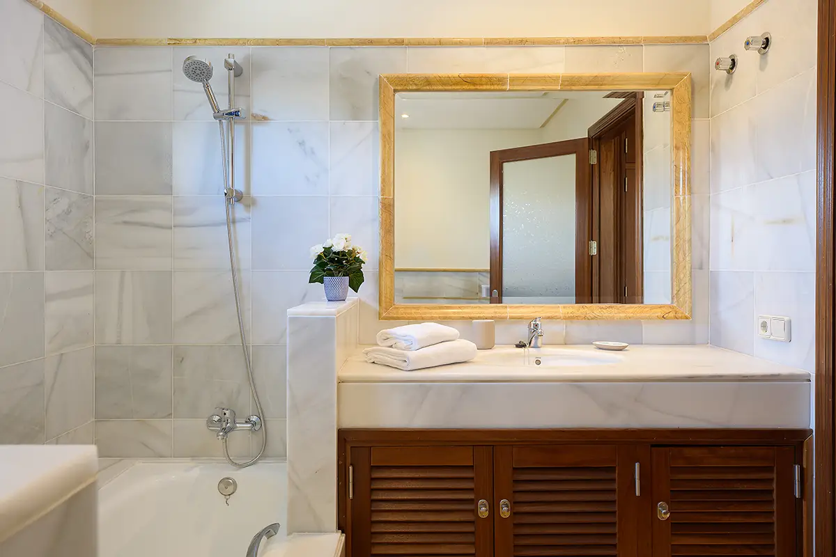 Bathroom with bathtub and shower at Villa Faro Park 189 Hipoclub
