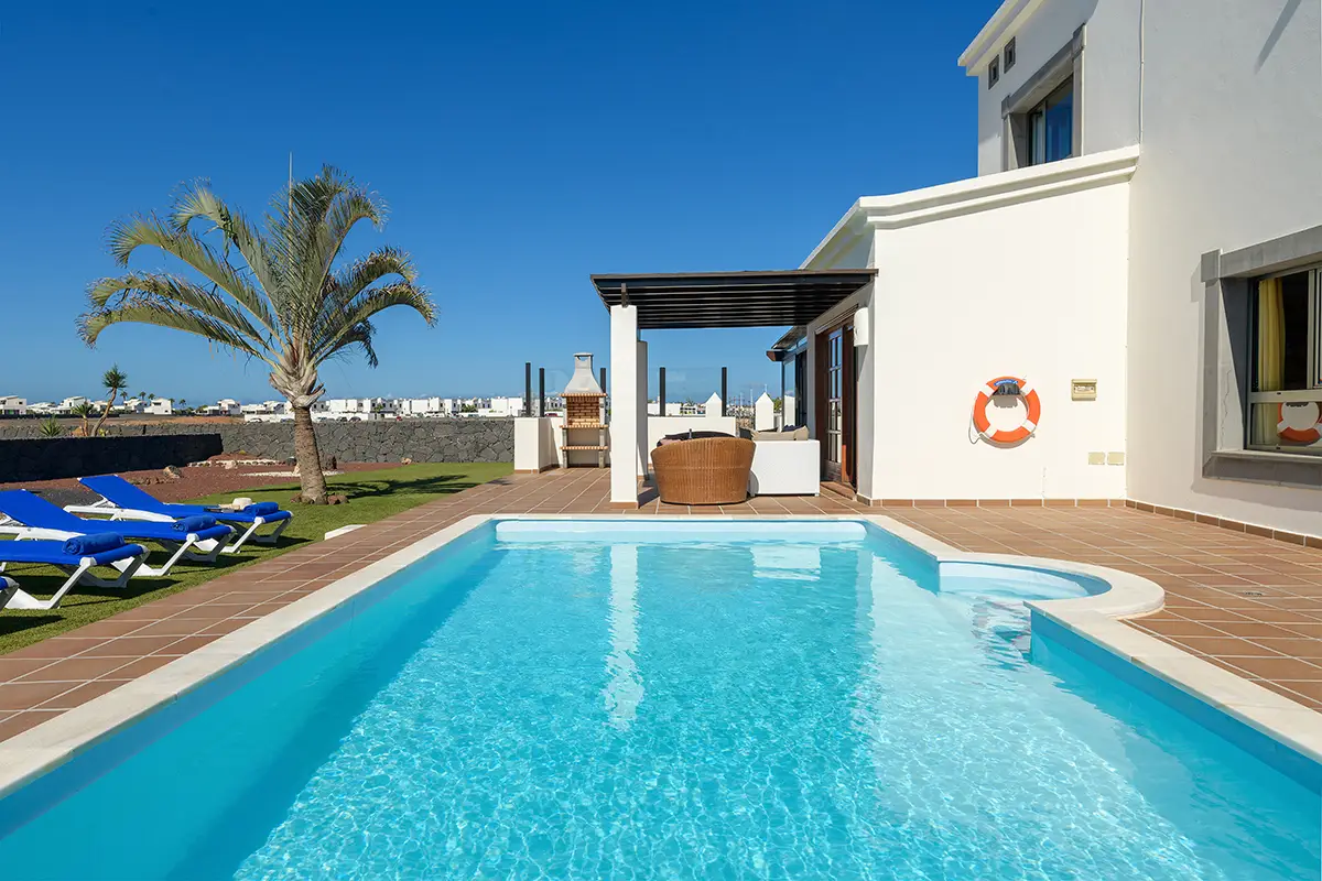 Spacious terrace next to the pool at Hipoclub Villa Aguamarina 1