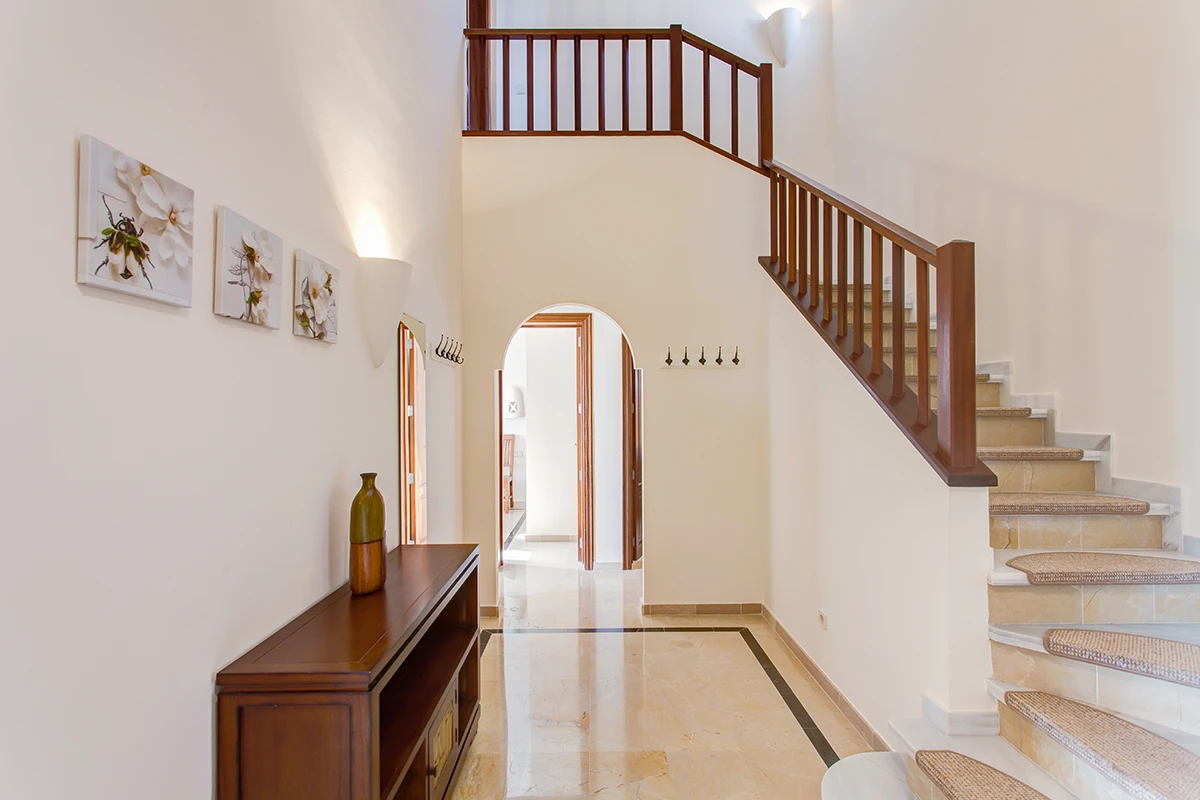 Indoor staircase leading to the upper floor at Hipoclub Villa Zafiro 34