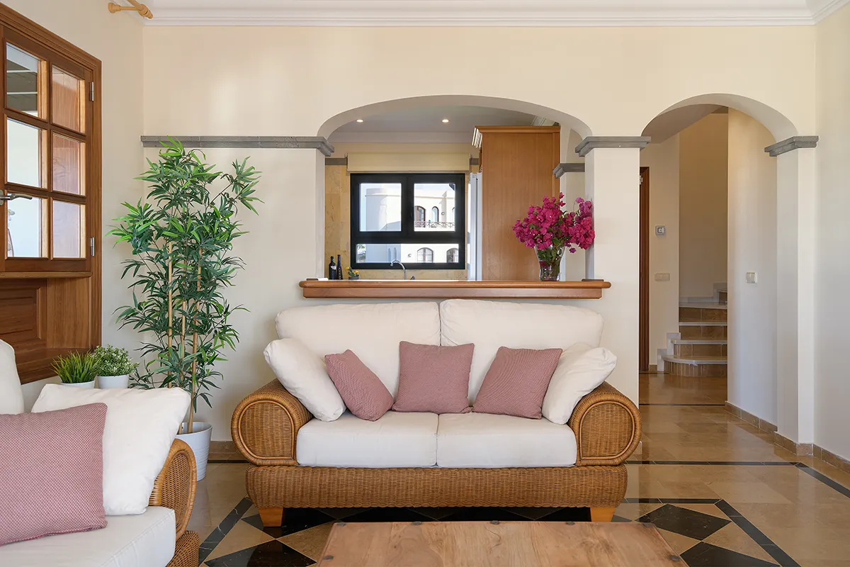 Living room connected to the kitchen through a serving hatch at Hipoclub Villa Aguamarina 1