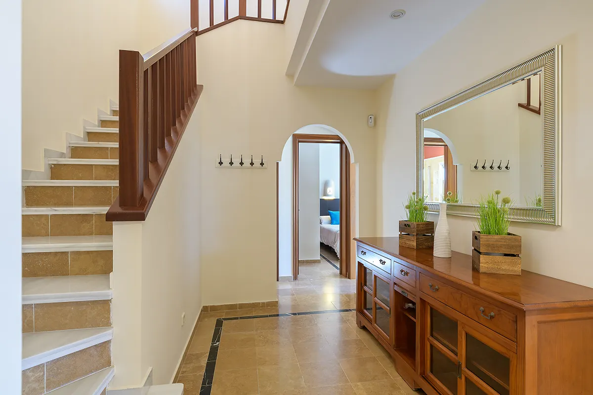Stairs to the upper floor at Hipoclub Villa Aguamarina 1