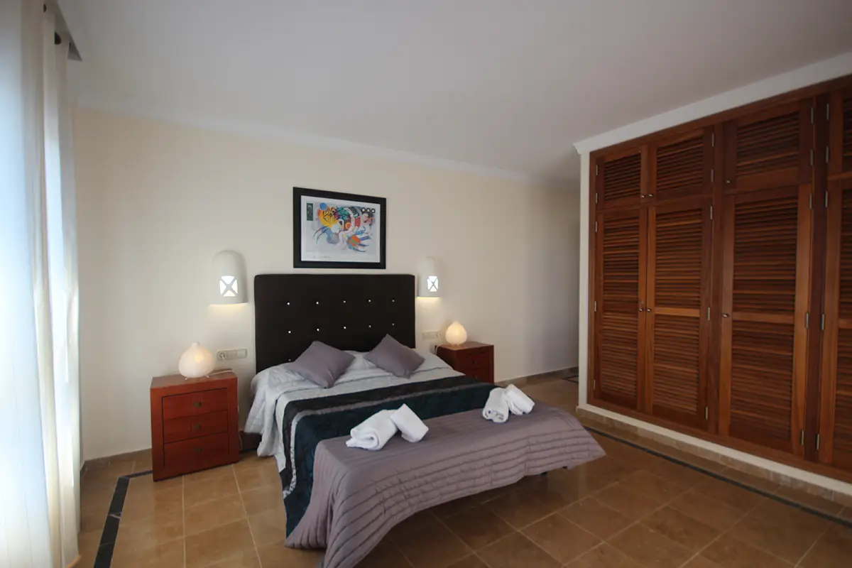 Dormitorio principal en Hipoclub Villa Aguamarina 11