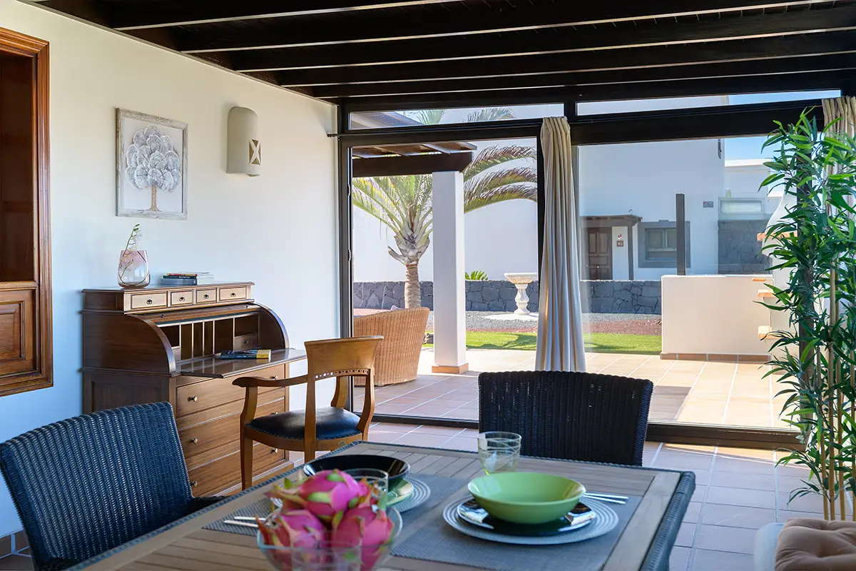 Dining room on fully glazed terrace at Hipoclub Villa Aguamarina 1