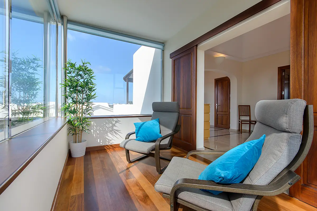 Covered terrace with views in the main bedroom at Villa Ámbar Hipoclub