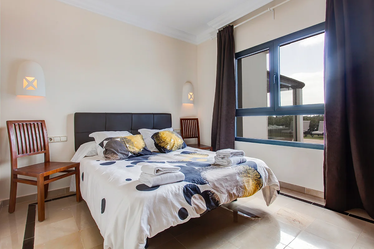 Comfortable and functional bedrooms at Hipoclub Villa Zafiro 34