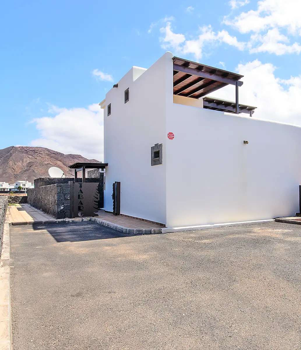Spacious outdoor parking View of the spacious outdoor parking at one of the Hipoclub Villas
