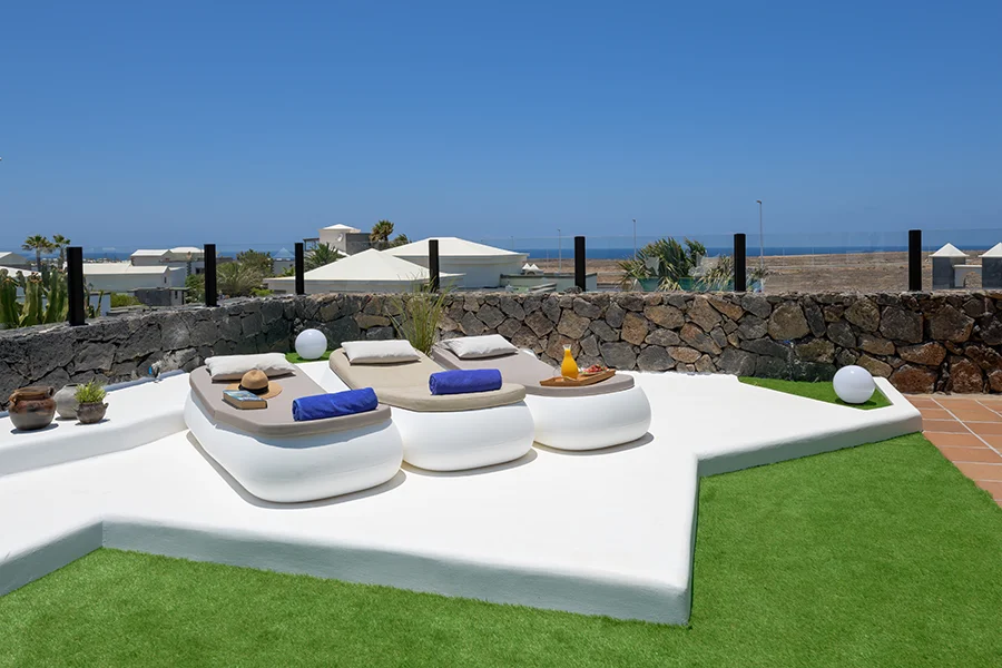 Sun loungers in the solarium area at Hipoclub Villas