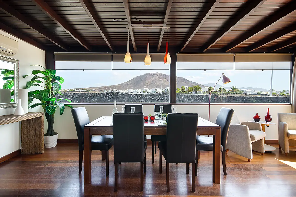 Dining room with beautiful views at Hipoclub Villa